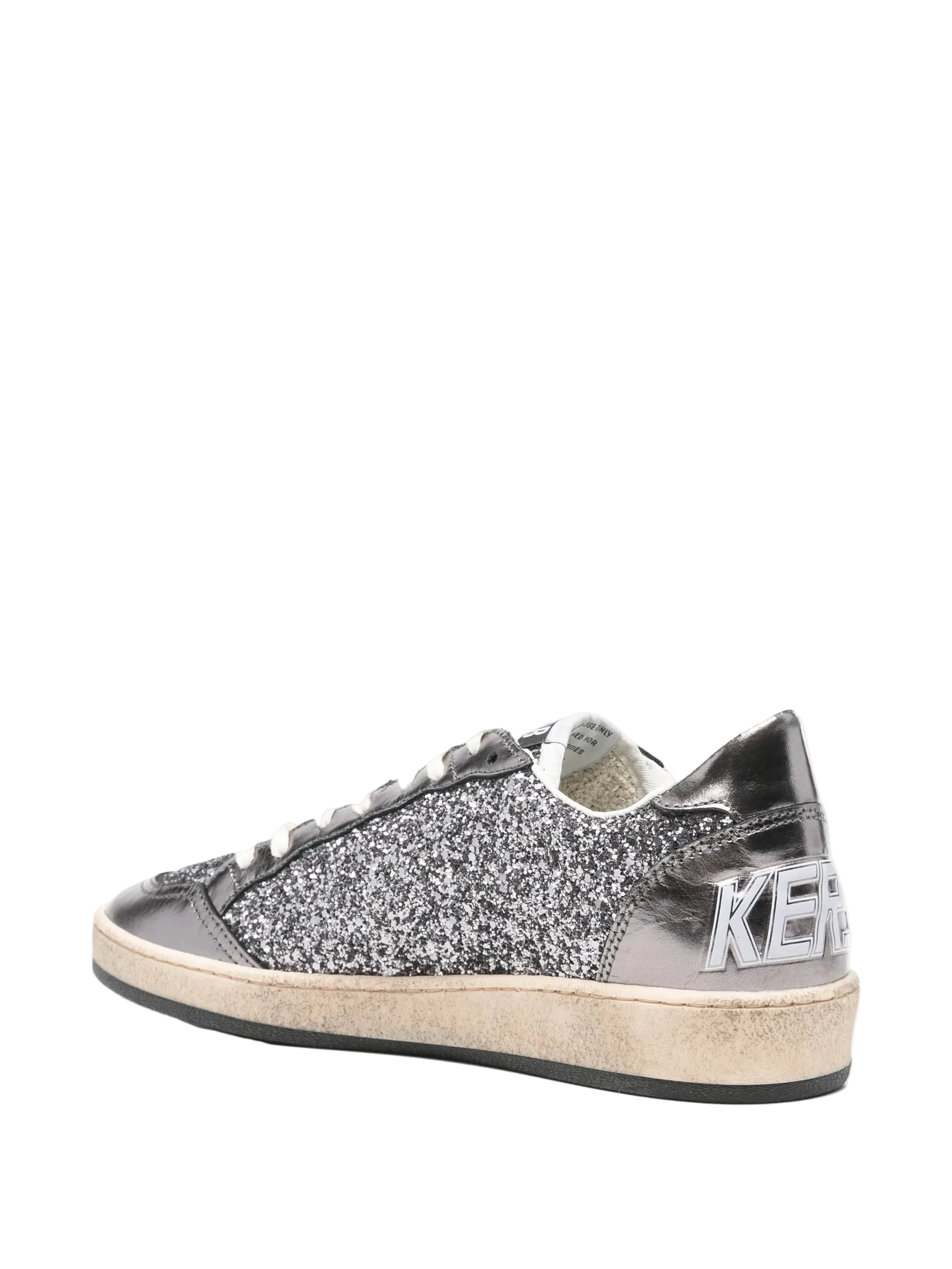 Silver glitter sneaker with brand logo on a white background