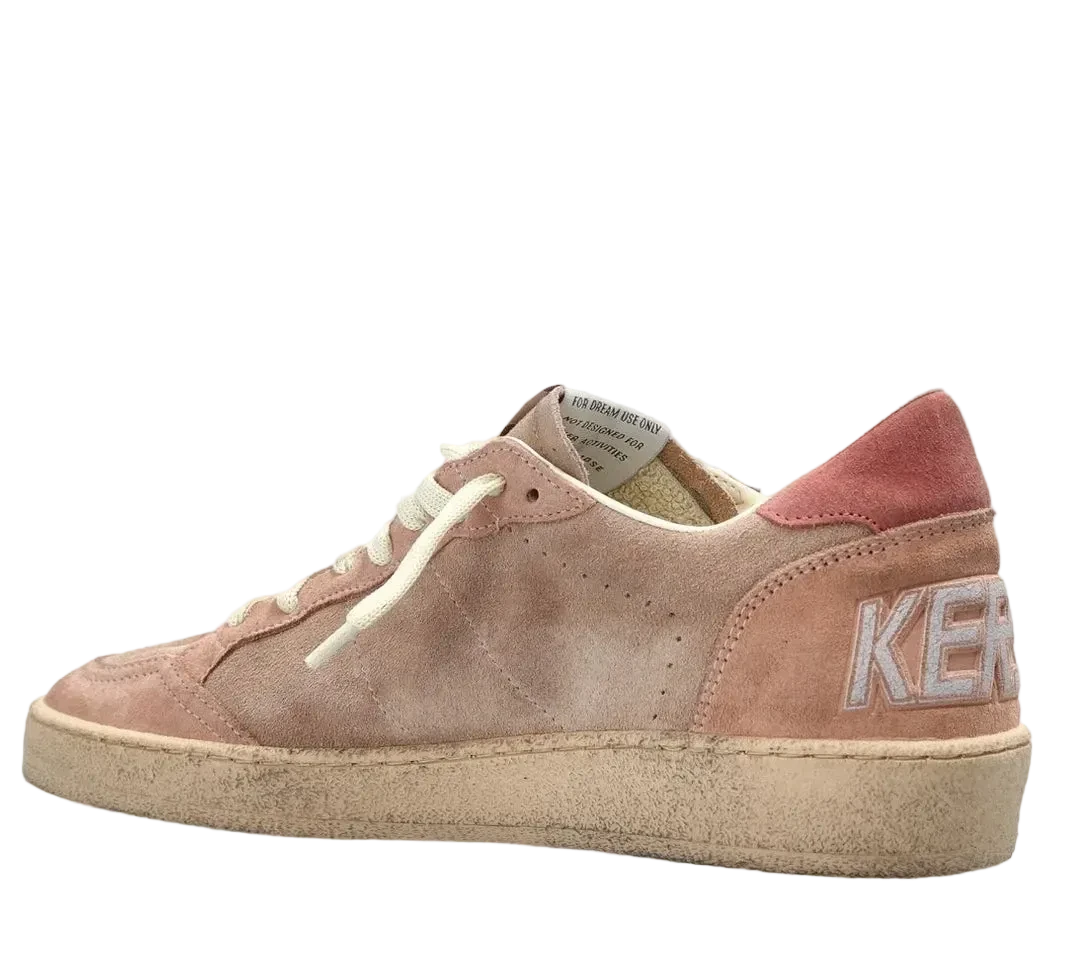 Brown sneaker with 'Kenzo' branding on a white background