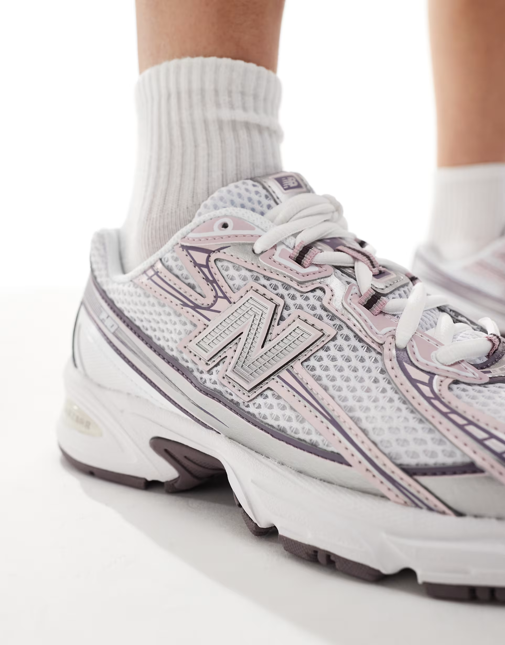 New Balance 740 sneakers in silver and pink