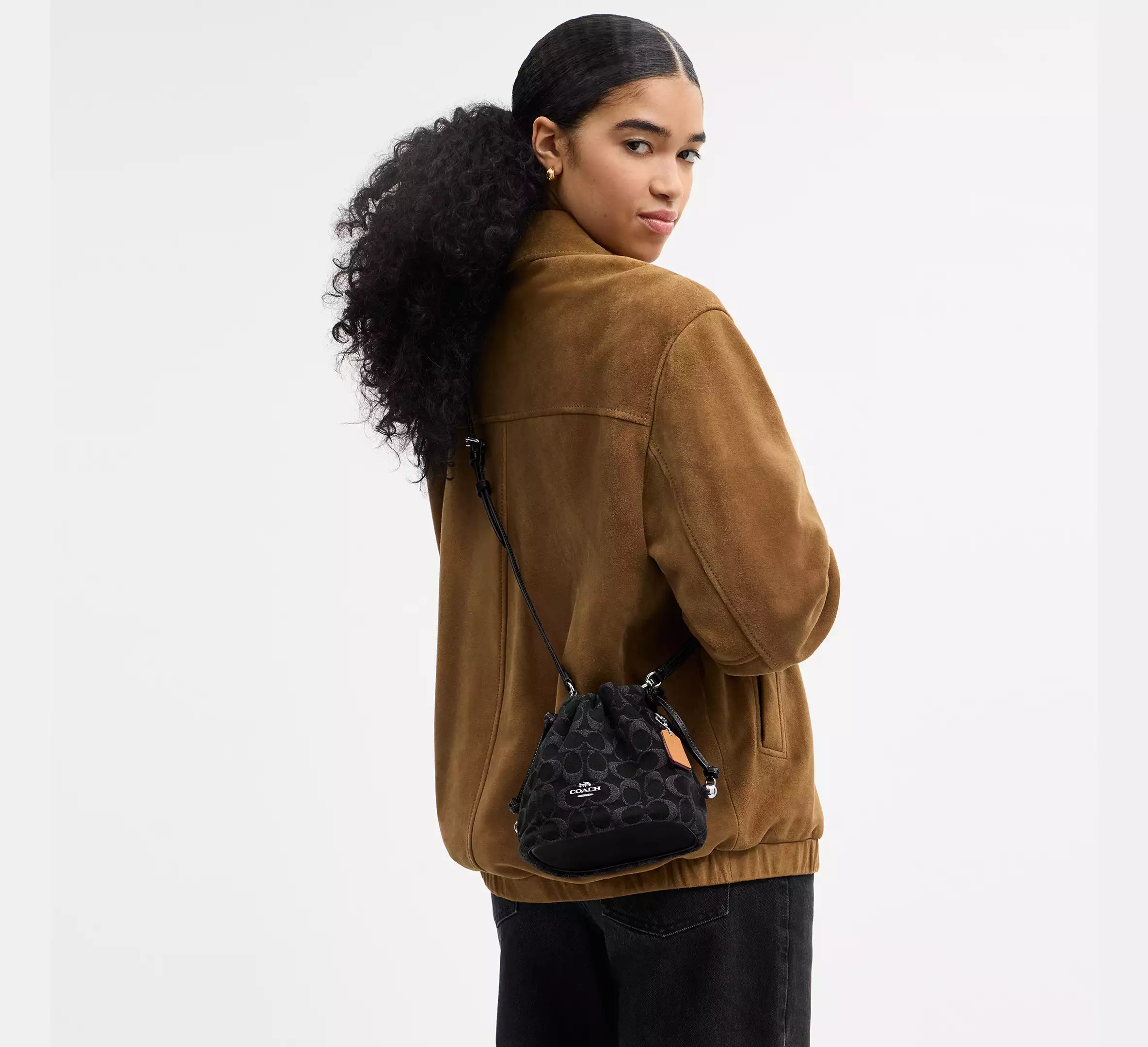 Faye Mini Drawstring Bag In Signature Denim