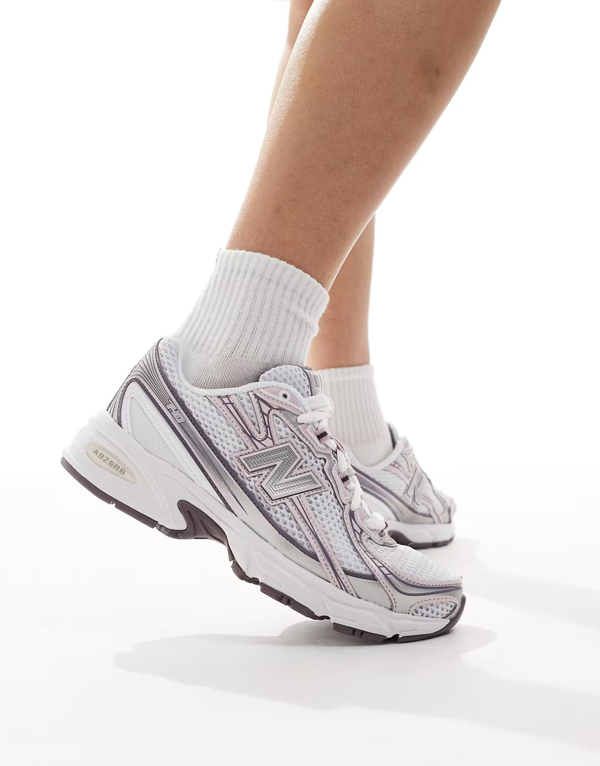 New Balance 740 sneakers in silver and pink