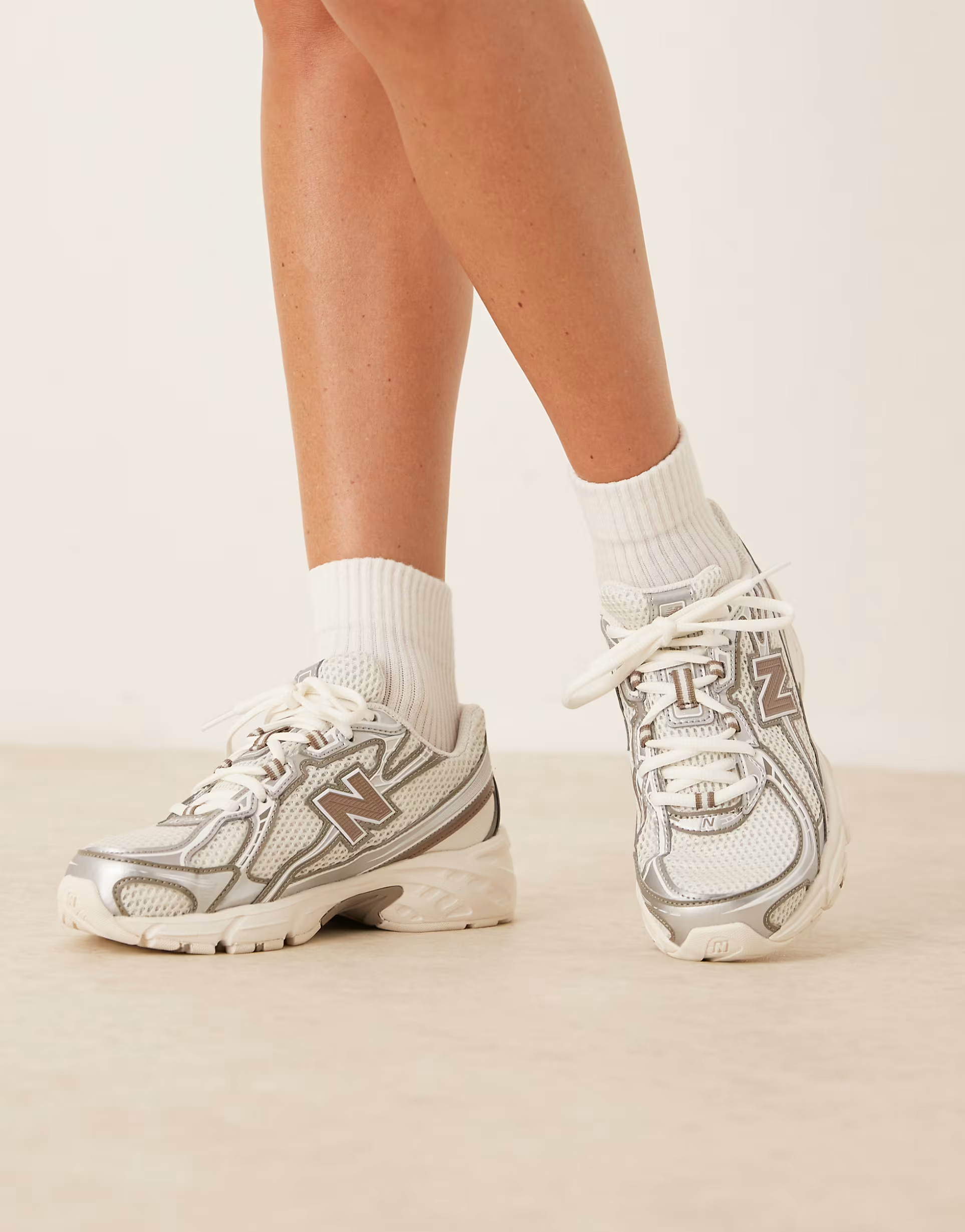 New Balance 740 sneakers in white, silver and beige