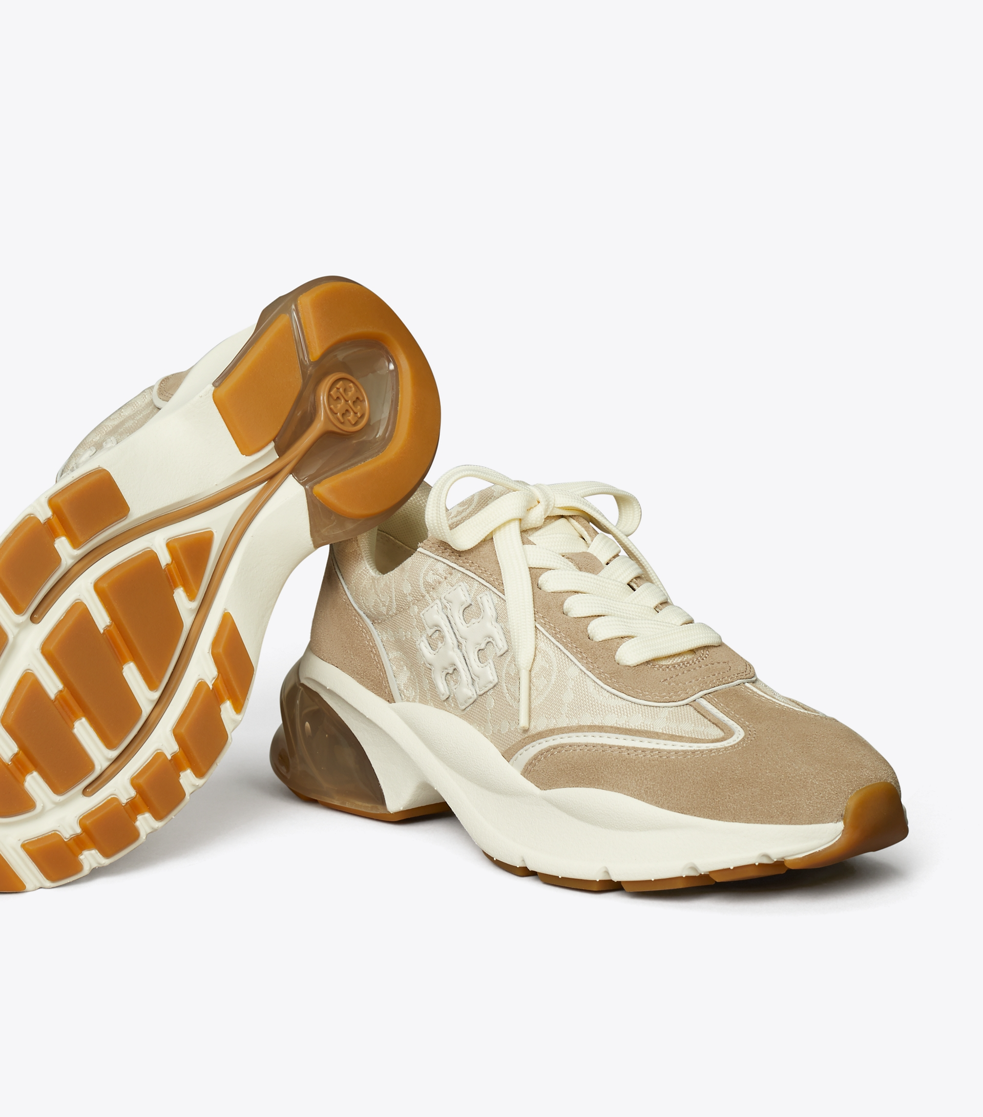 T MONOGRAM GOOD LUCK TRAINER