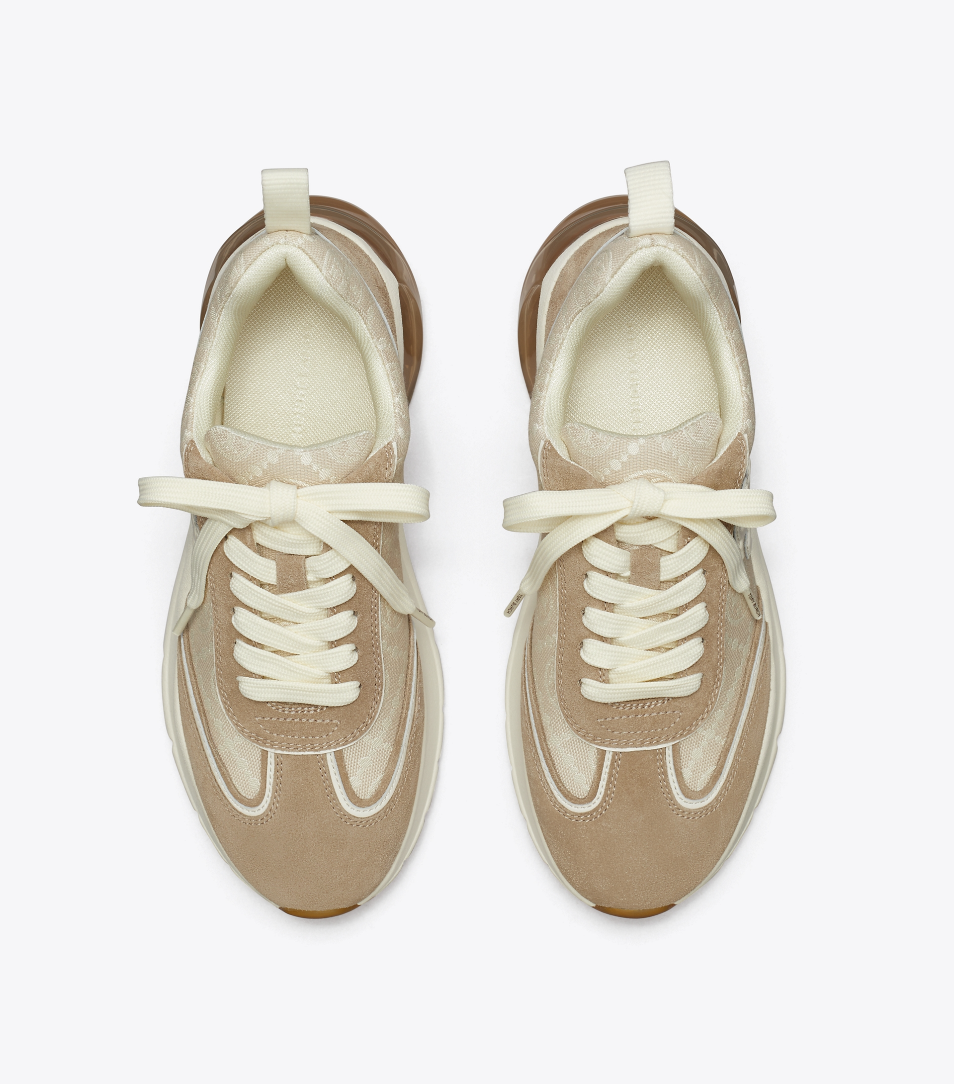 T MONOGRAM GOOD LUCK TRAINER